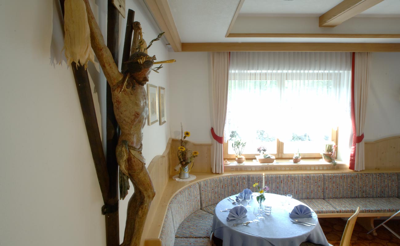 Large wooden crucifix in the dining room