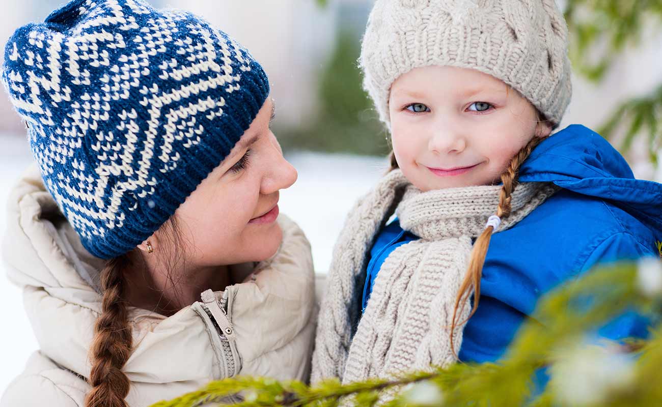 Mother and child outdoors in winter